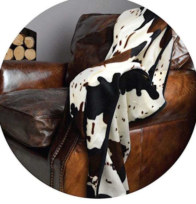COW PRINT SNUGGLE CUSHION